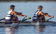 Rowers shown wearing sun protective headwear and sunglasses as recommended by the University of Otago study image