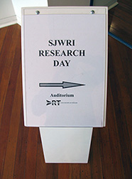 SJWRI Research Day sign