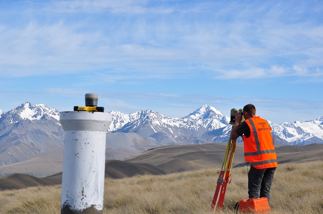 AORAKI2013, Tyler measuring the summit with a Wild T3000