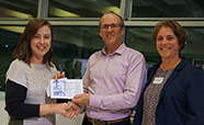 Jessika Wise receiving her Rutherford Poster Prize from Professor Martin Kennedy and HRSC Chair, Associate Professor Margaret Currie thumbnail