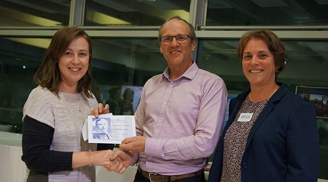 Jessika Wise receiving her Rutherford Poster Prize from Professor Martin Kennedy and HRSC Chair, Associate Professor Margaret Currie