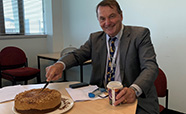Professor Gary Hooper with his surprise birthday cake thumbnail