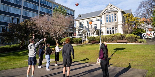 Studholme students playing basketball outside