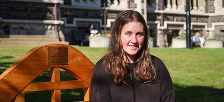 Emilia Haszard sitting on bench