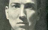 A photograph of Robert Graves. 