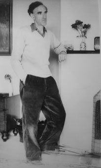 Charles Brasch in a reflective mood in his house at Heriot Row c.1955, Brasch Papers, MS 996-12/94.